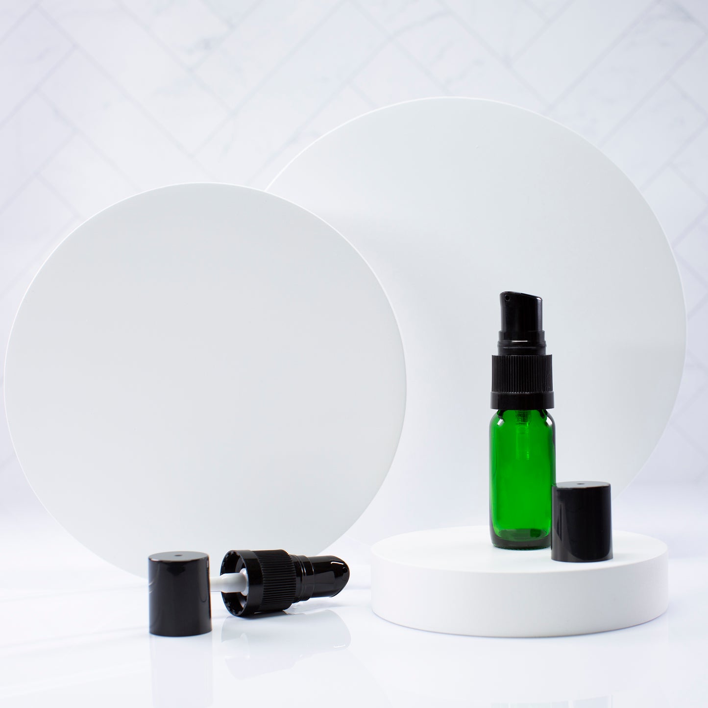0.5 oz Green Glass Bottle with 18-400 Black Treatment Pump