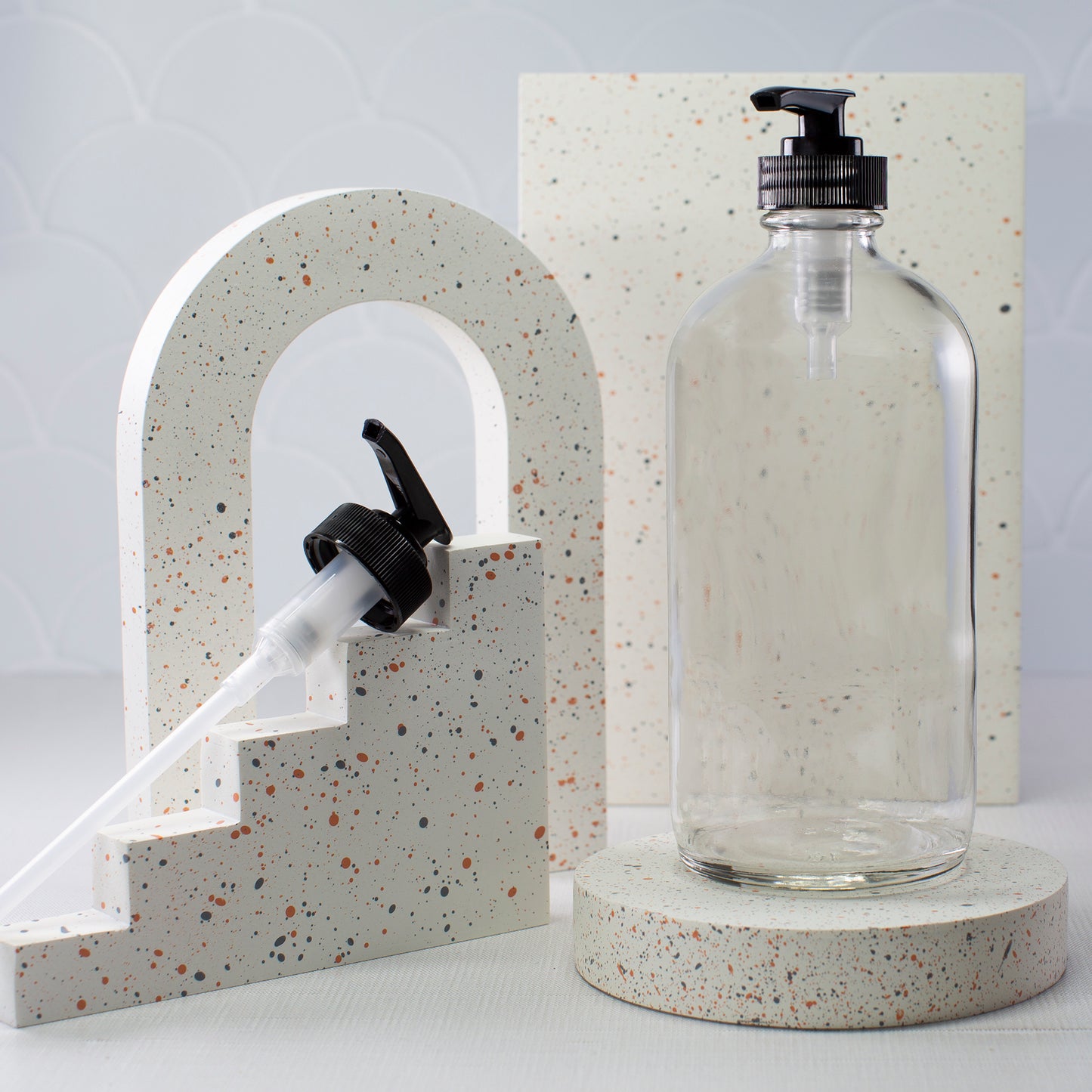 16 oz Clear Glass Bottle with 28-400 Black Saddle Pump