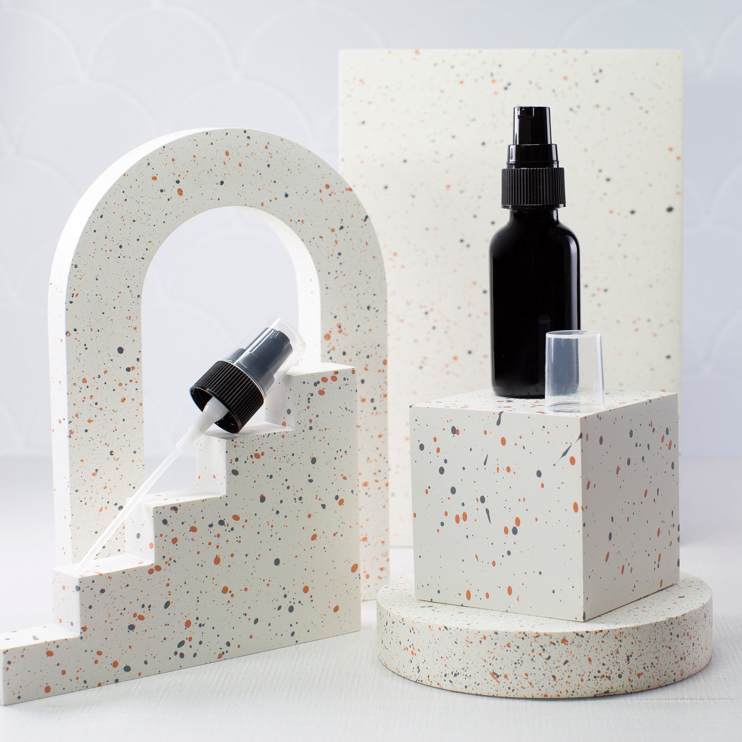 1 oz Black Glass Bottle with 20-400 Black Treatment Pump