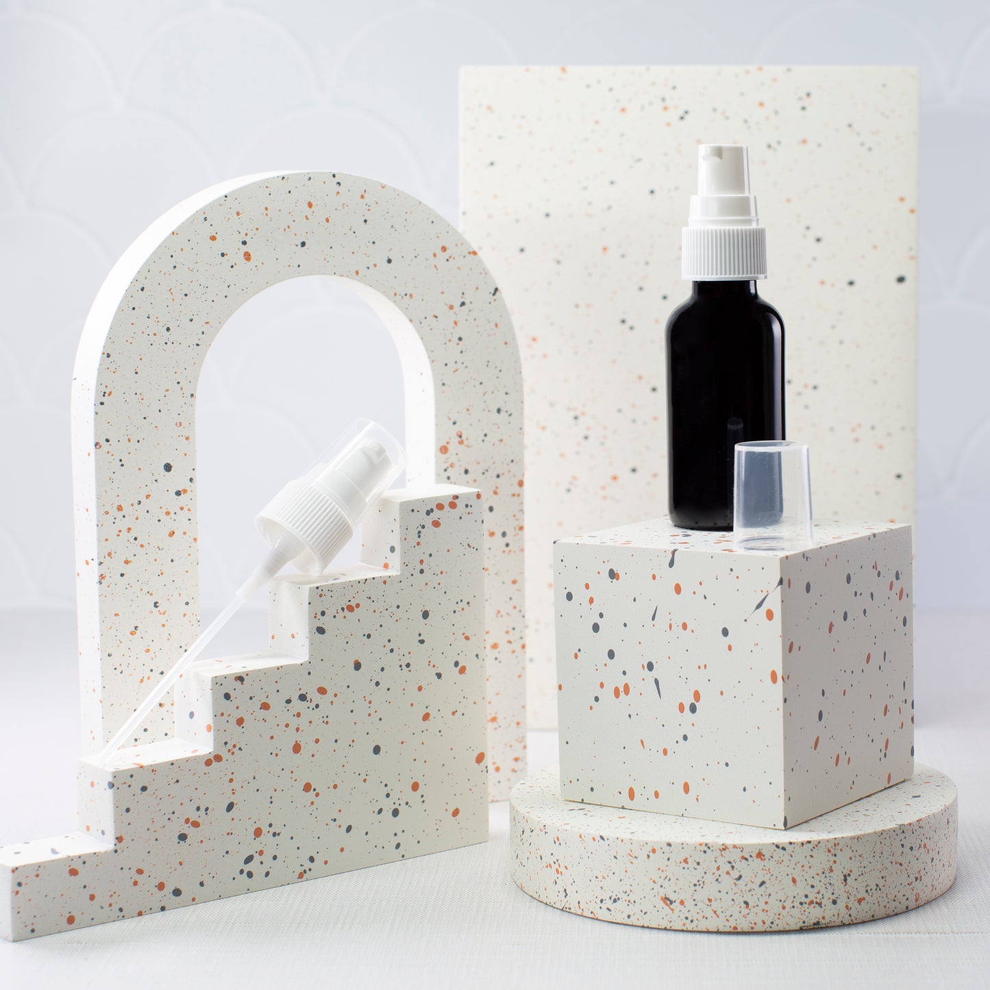 1 oz Black Glass Bottle with 20-400 White Treatment Pump