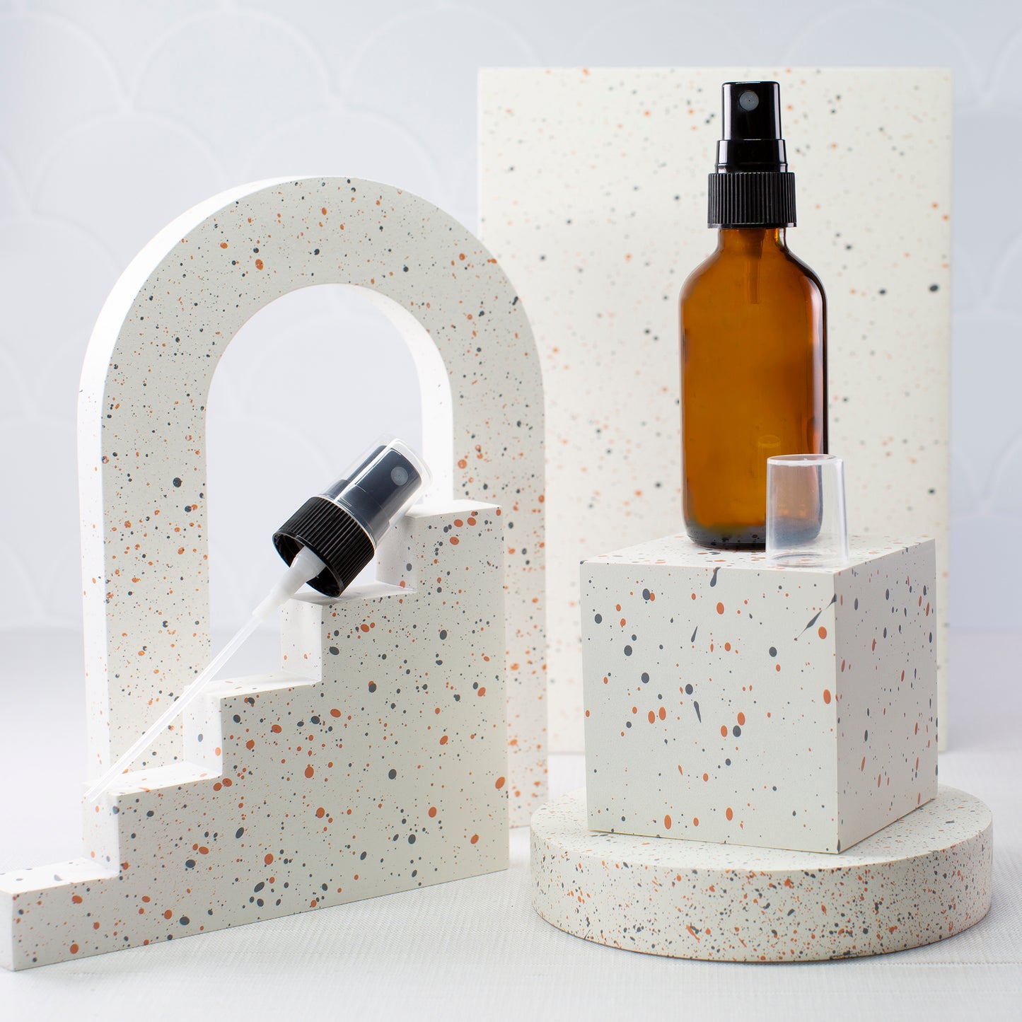 2 oz Amber Glass Bottle with 20-400 Black Fine Mist Sprayer