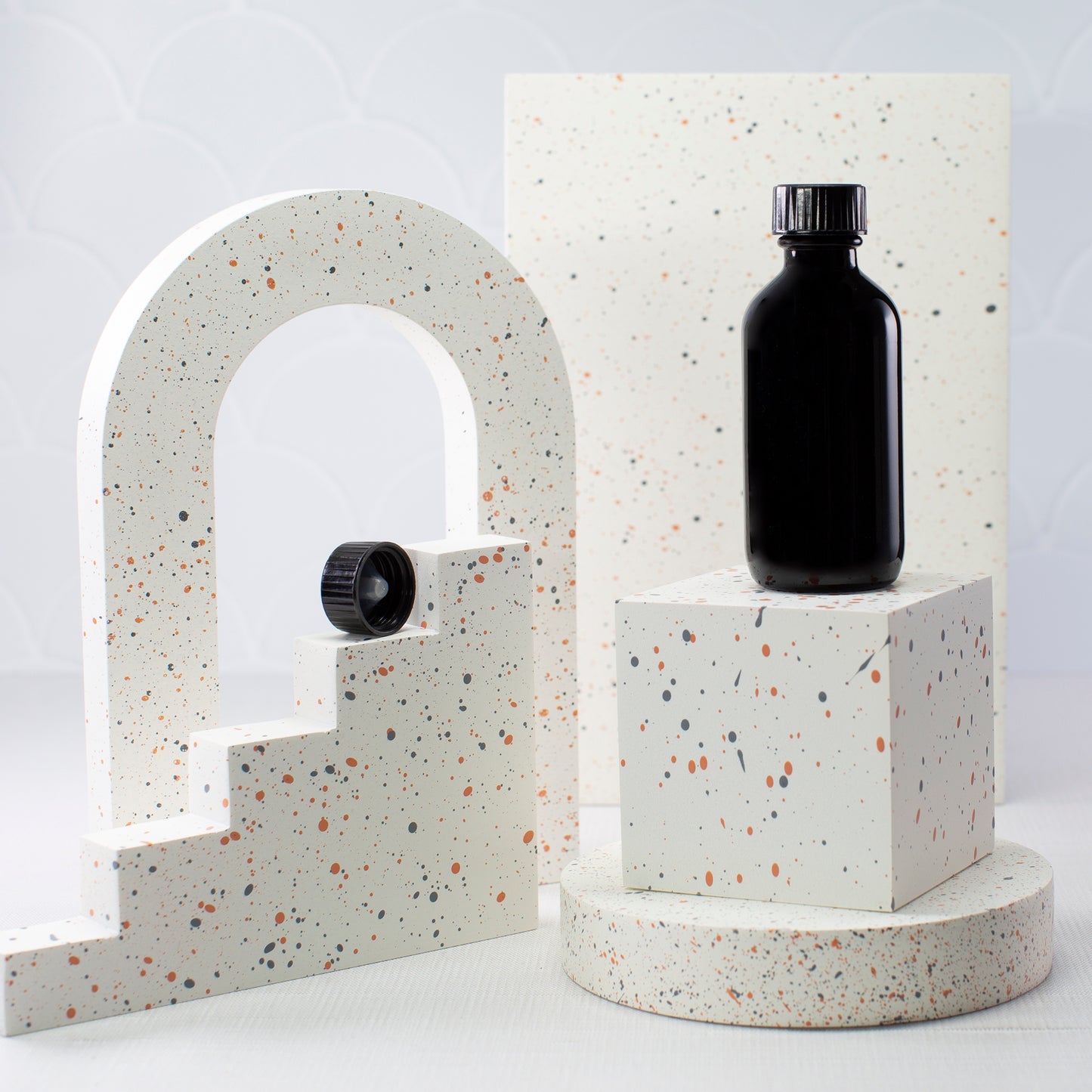 2 oz Black Glass Bottle with 20-400 Black Phenolic Cap