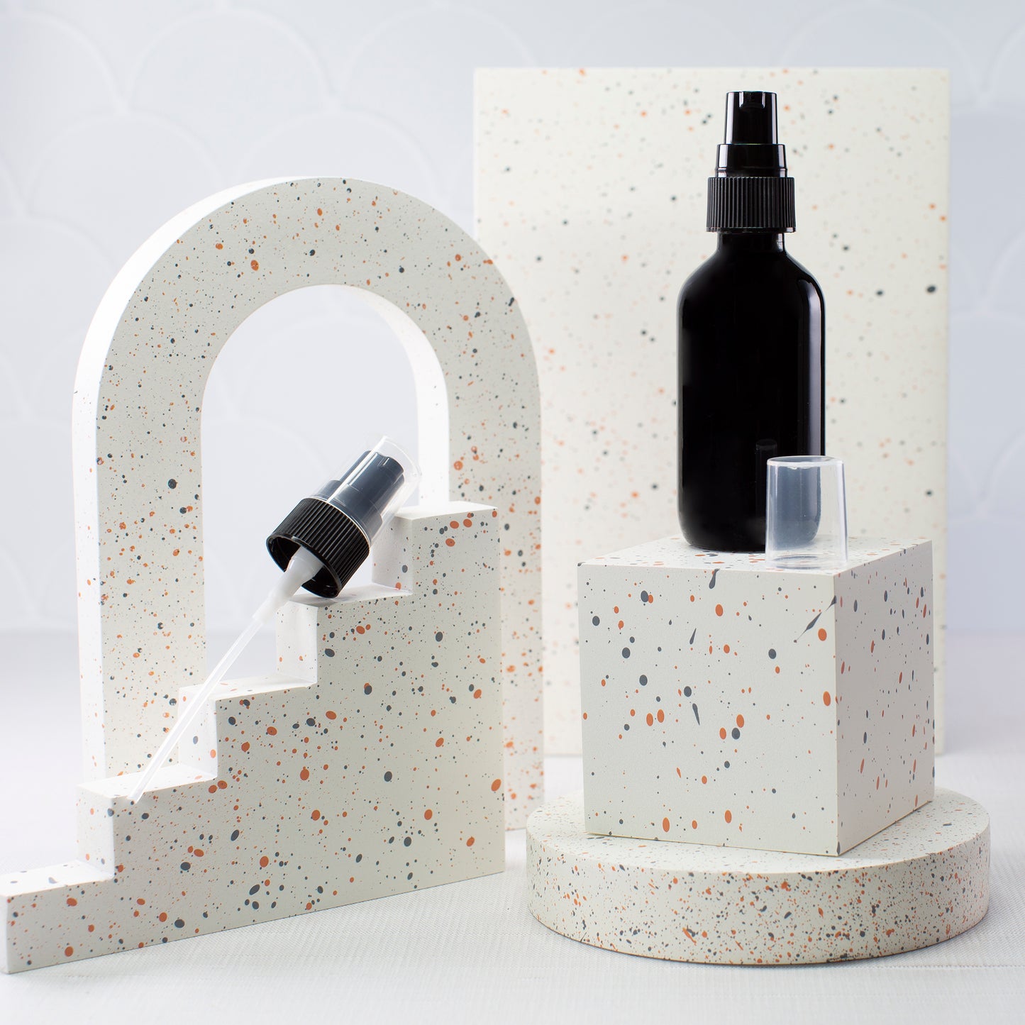 2 oz Black Glass Bottle with 20-400 Black Treatment Pump