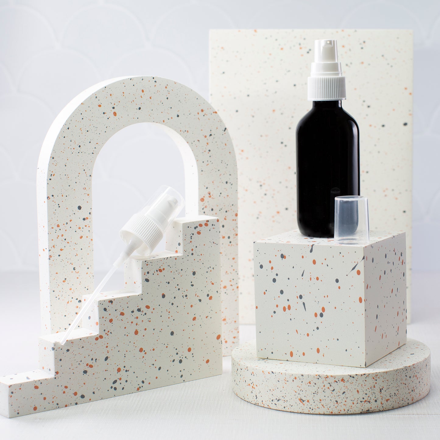 2 oz Black Glass Bottle with 20-400 White Treatment Pump