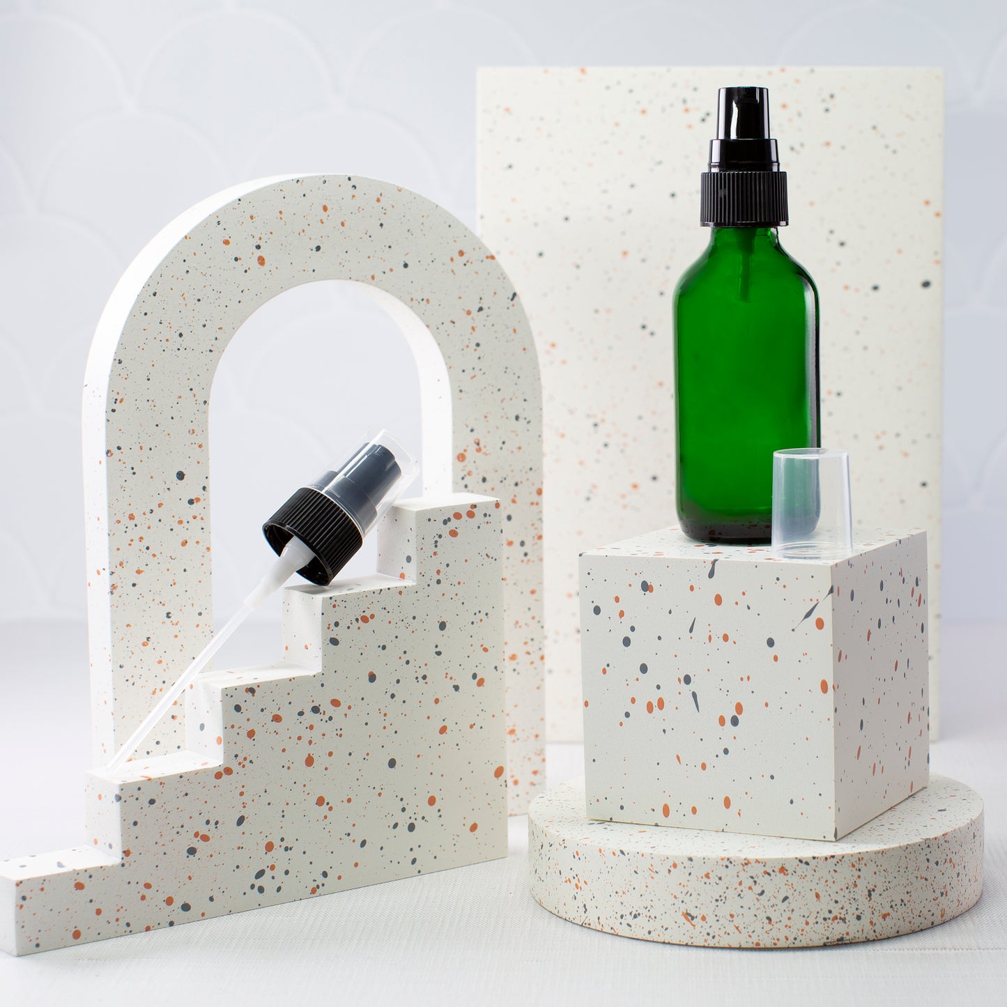 2 oz Green Glass Bottle with 20-400 Black Treatment Pump