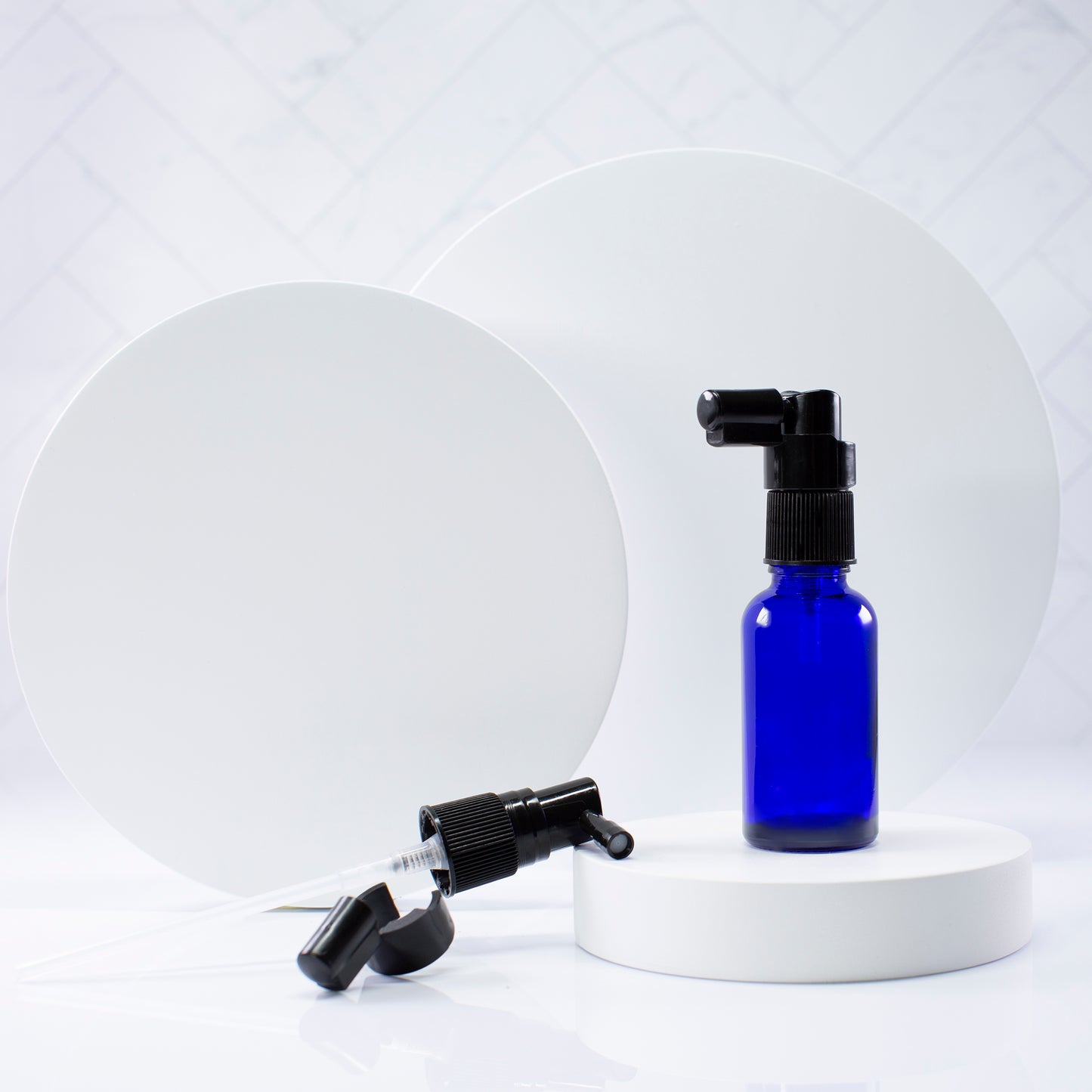30 ml Blue Essential Oil Bottle with 18mm Black Spray Pump