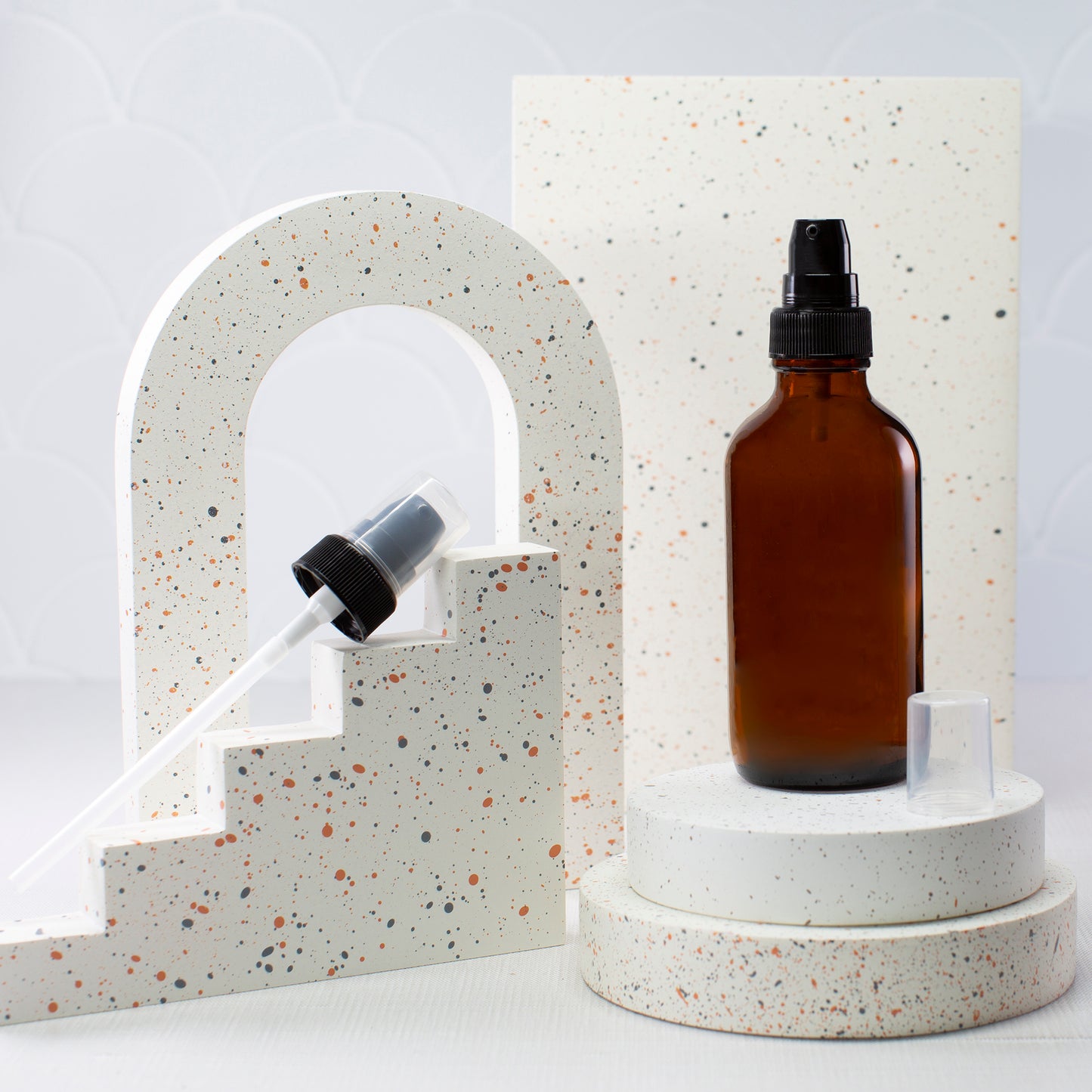 4 oz Amber Glass Bottle with 22-400 Black Treatment Pump