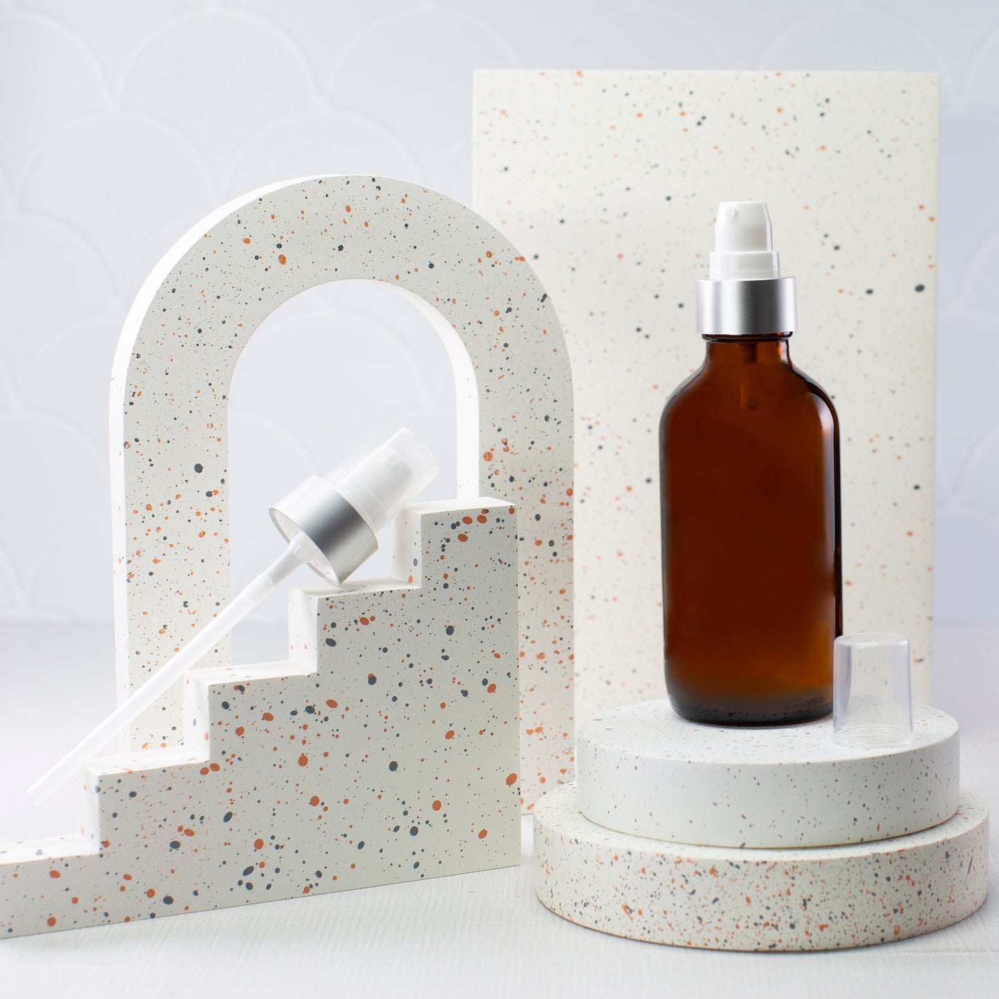 4 oz Amber Glass Bottle with 22-400 White Treatment Pump with Brushed Aluminum Shell