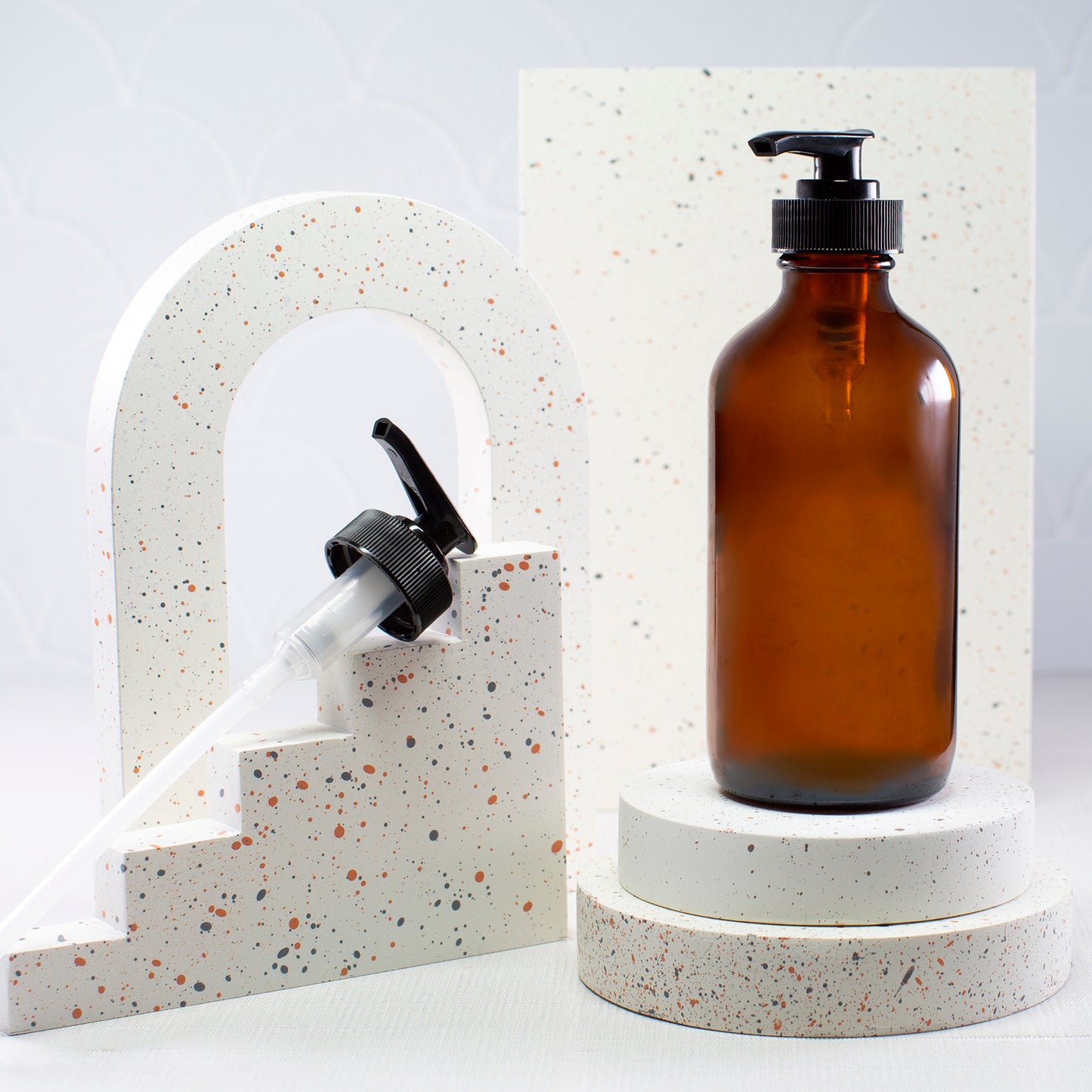 8 oz Amber Glass Bottle with 28-400 Black Saddle Pump
