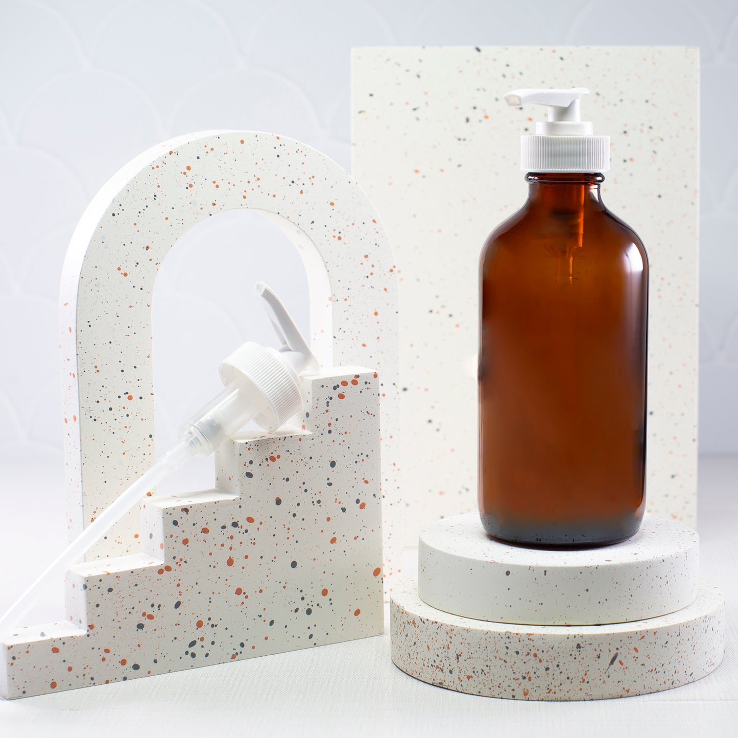 8 oz Amber Glass Bottle with 28-400 White Saddle Pump