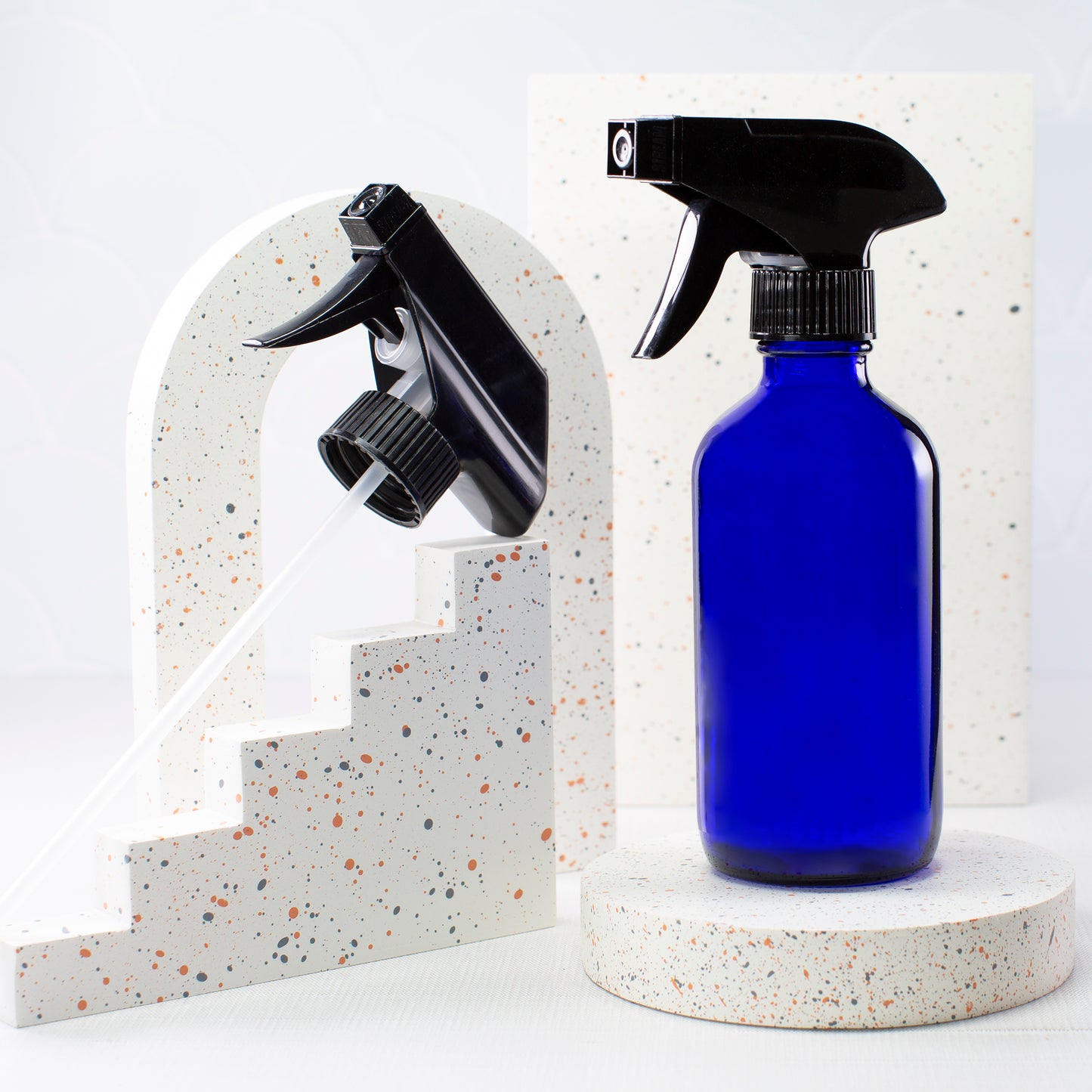 16 oz Blue Glass Boston Round Bottle with 28-400 Black Trigger Sprayer