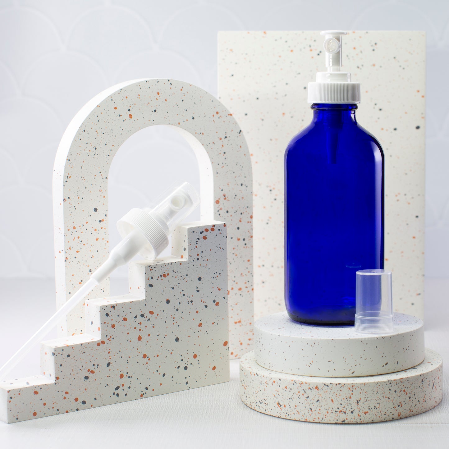 16 oz Blue Glass Boston Round Bottle with 28-400 White Regular Mist Sprayer