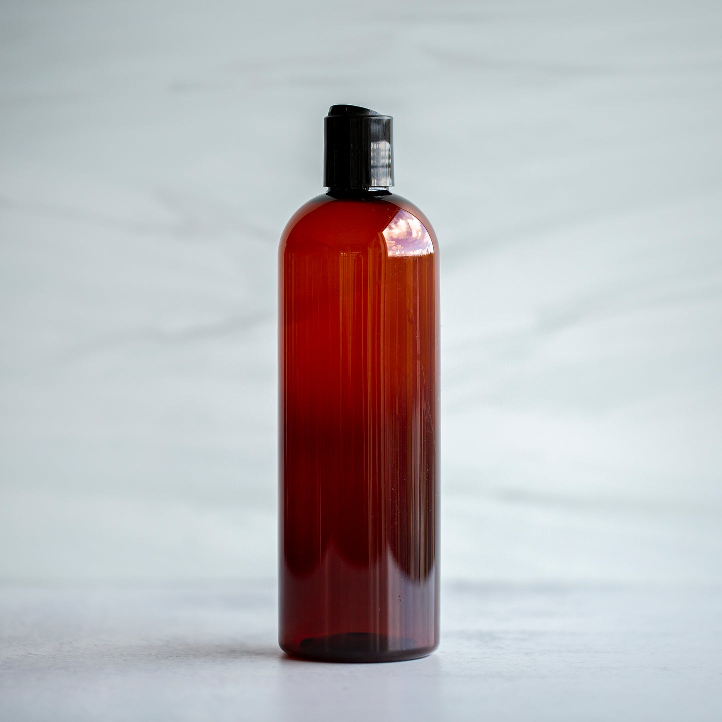 16 oz Amber Bullet with Black Disc Cap