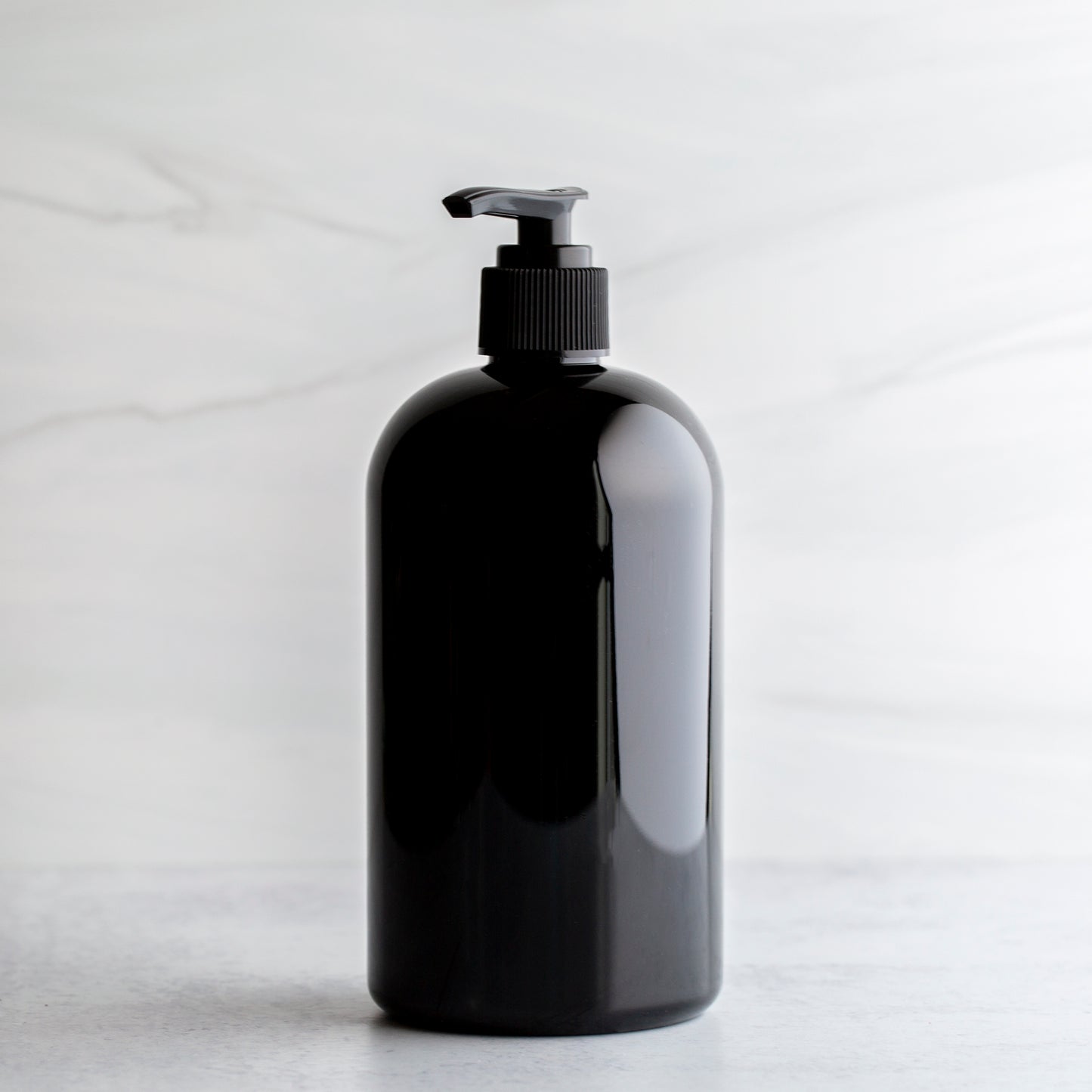 16oz Black Boston Round Bottle with Black Pump