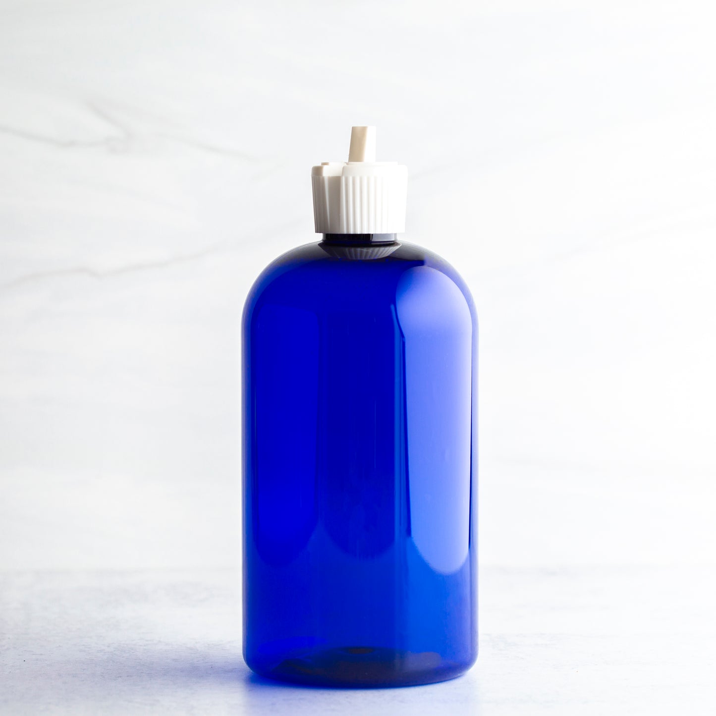 16 oz Blue Boston Round Bottle with 24-410 White Turret Cap