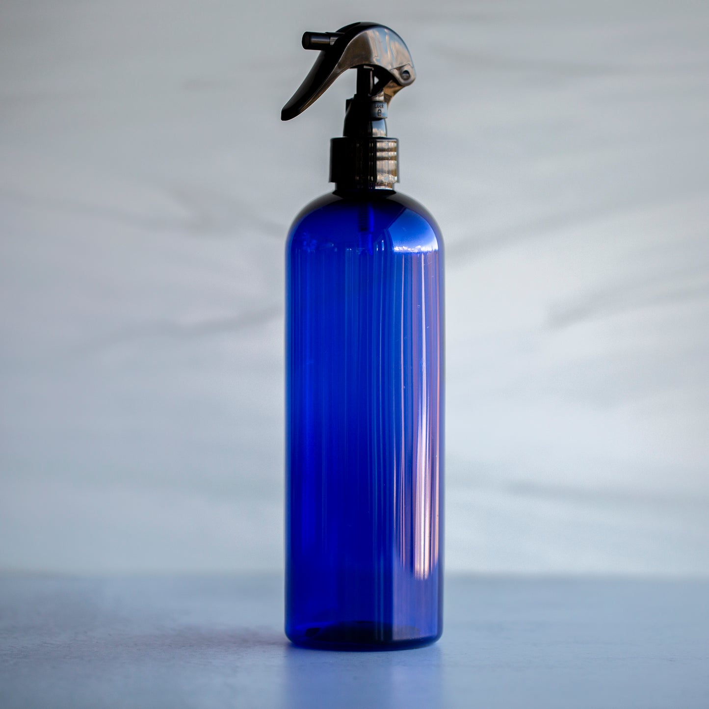 16 oz Blue Bullet Bottle with Black Mini Trigger Sprayer