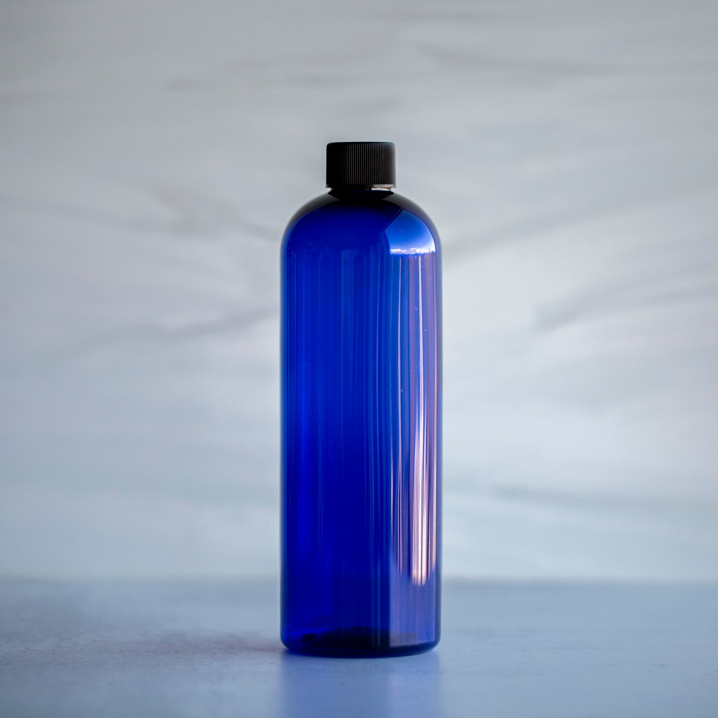 16 oz Blue Bullet Bottle with Black Screw Cap