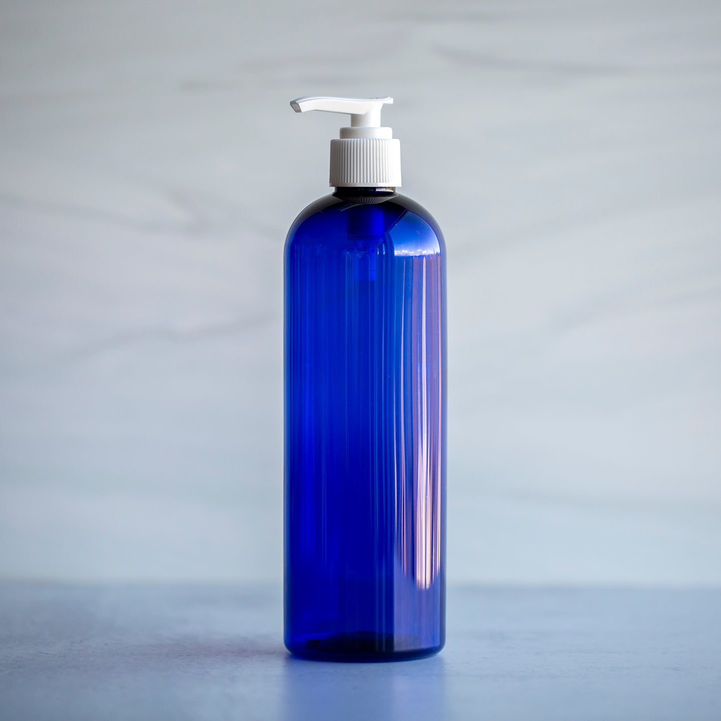 16 oz Blue Bullet Bottle with White Pump