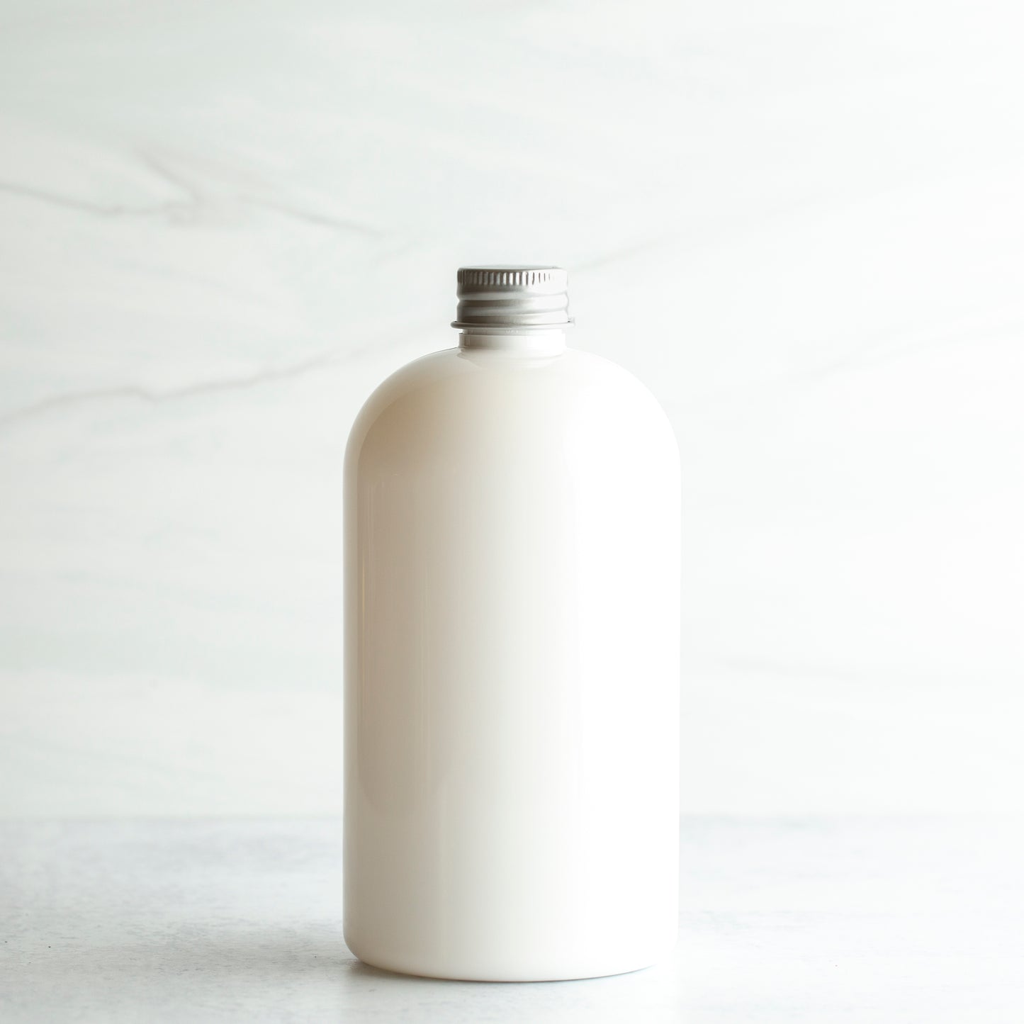 16 oz White PET Boston Round Bottle with 24-410 Aluminum Cap