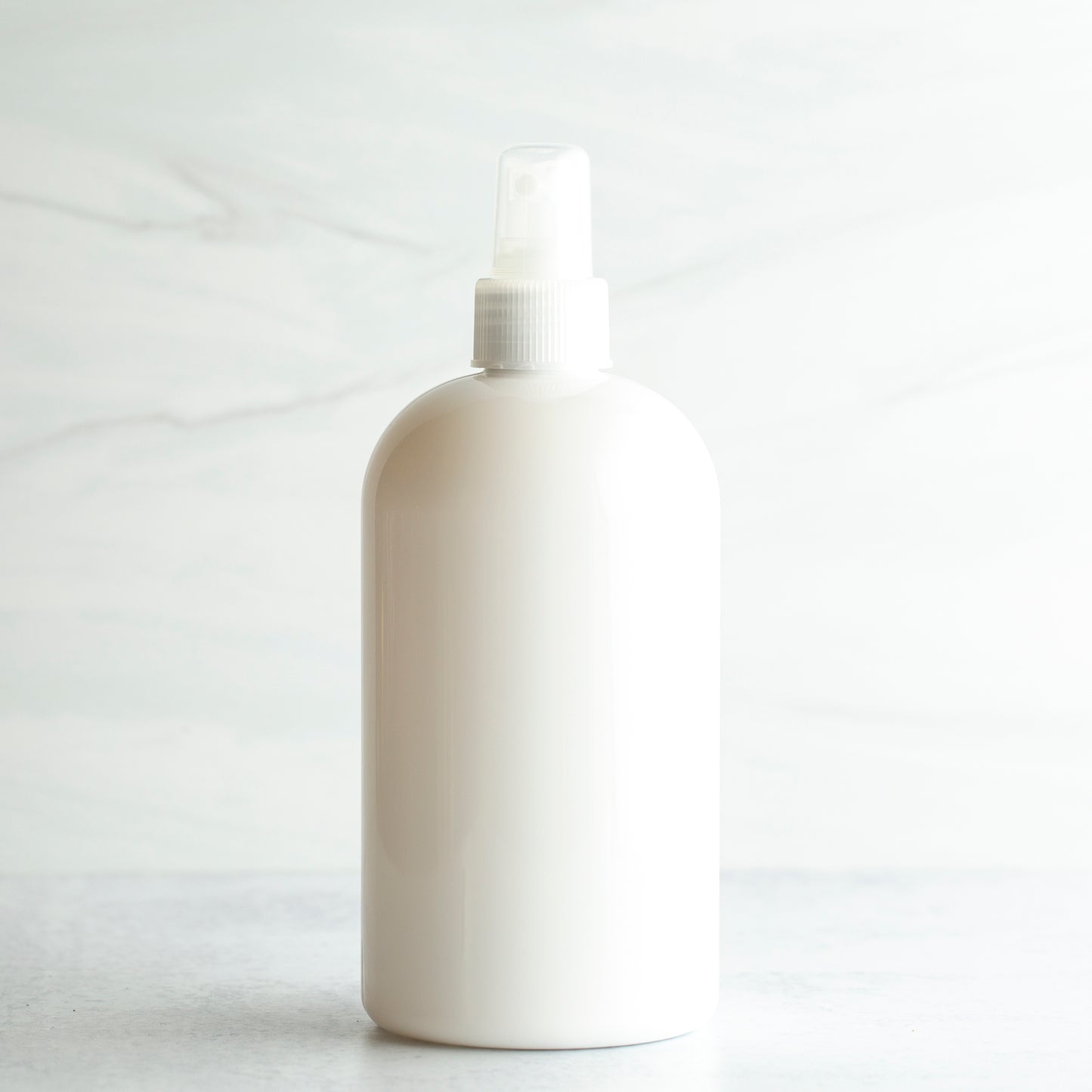 16 oz White PET Boston Round Bottle with 24-410 Natural Fine Mist Sprayer