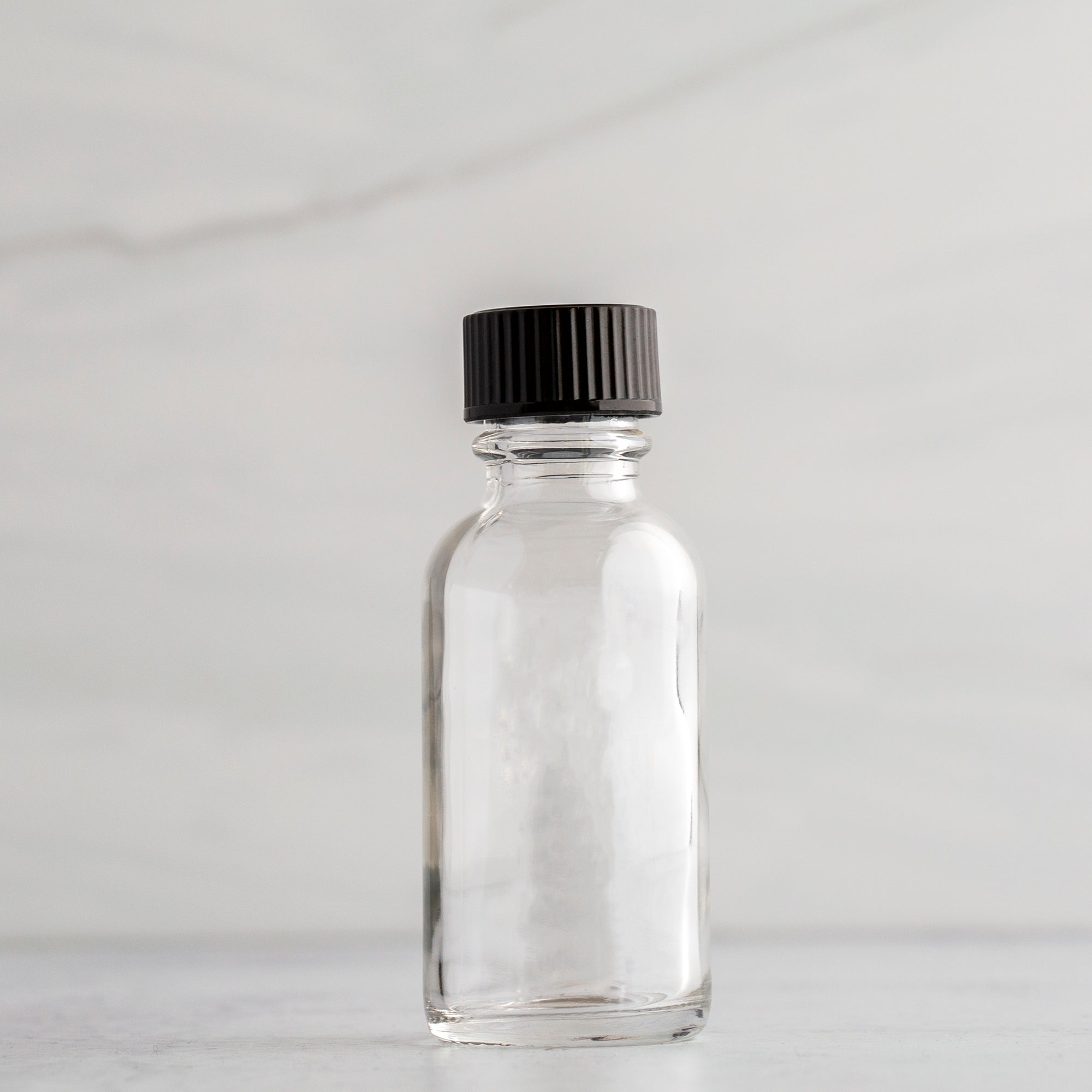 1 oz Clear Glass Bottle with Black Phenolic Cap