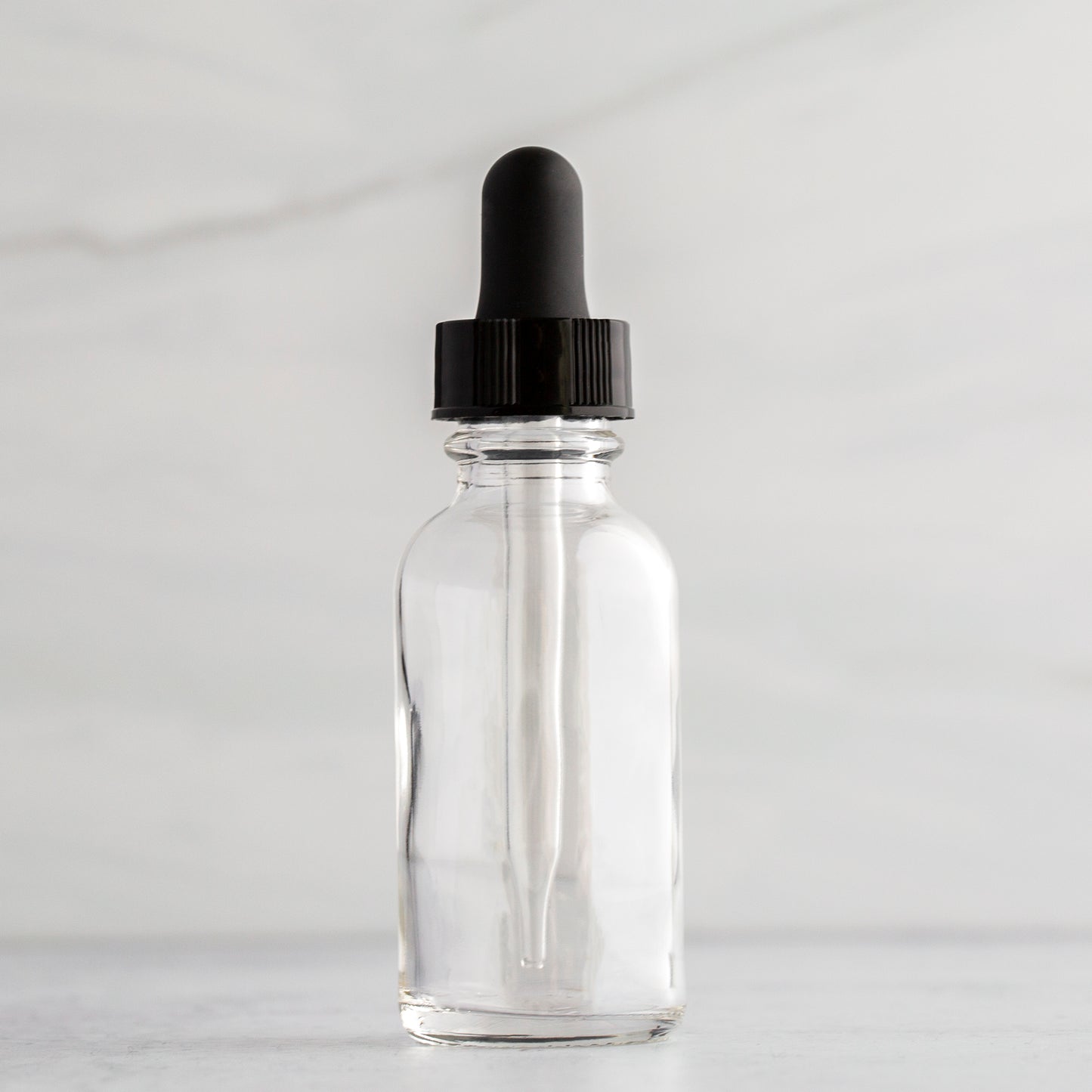 1 oz Clear Glass Bottle with Black Glass Tube Dropper