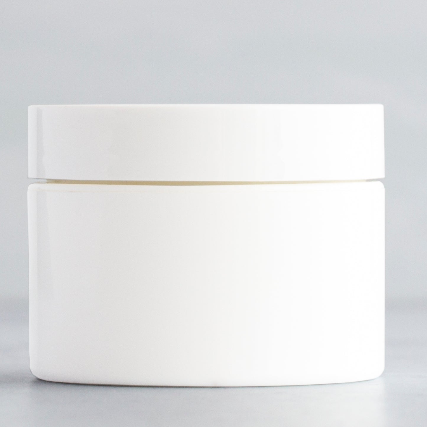 1 oz White Square Base Plastic Jar with White Gloss Flat Cap