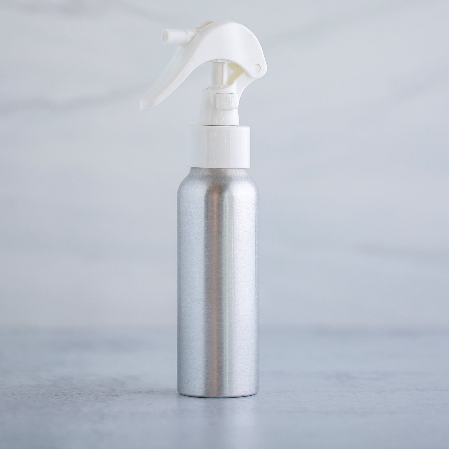 80 ml / 2.7 oz Aluminum Bottle with 24-410 White Mini Trigger Sprayer