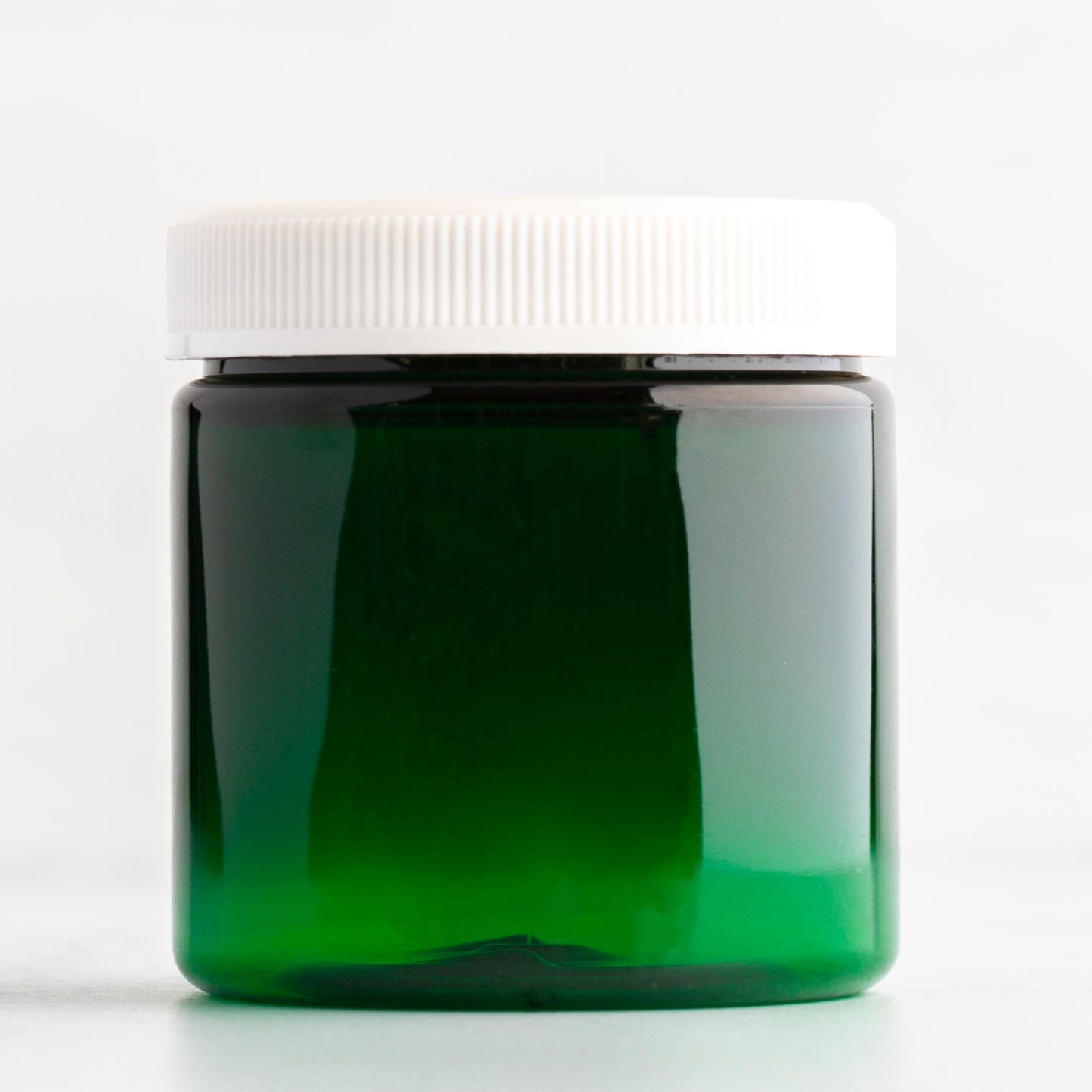 4 oz Green Straight Sided Plastic Jar with White Ribbed Cap