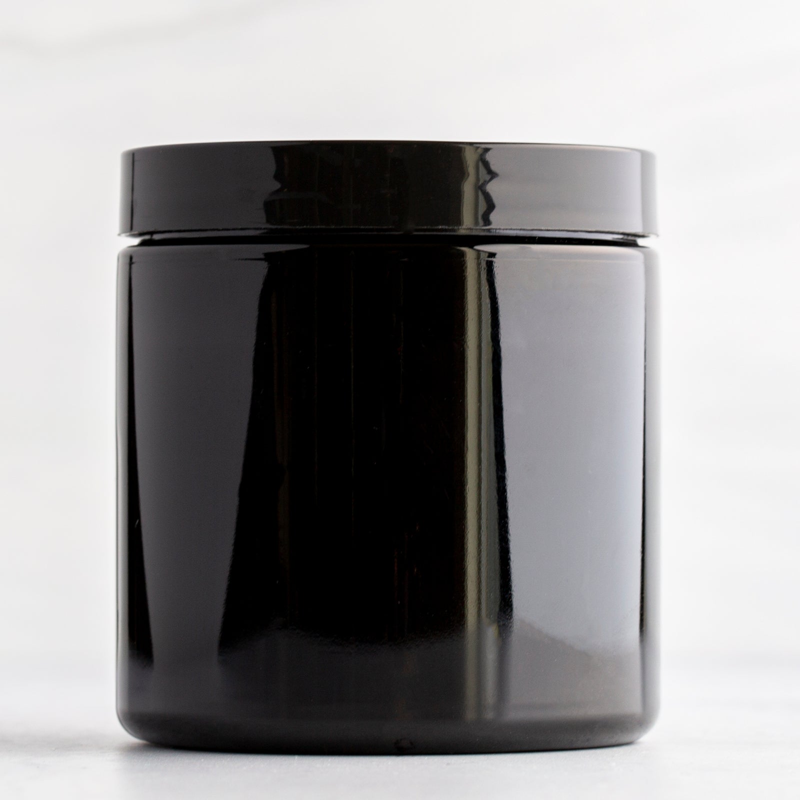 8oz Black Plastic Jar with Black Gloss Flat Cap