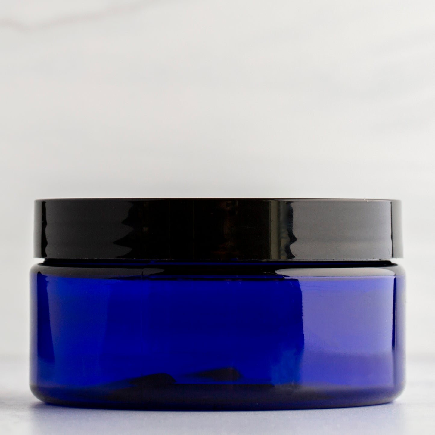 8 oz Blue Shallow Plastic Jar with Black Flat Gloss Cap