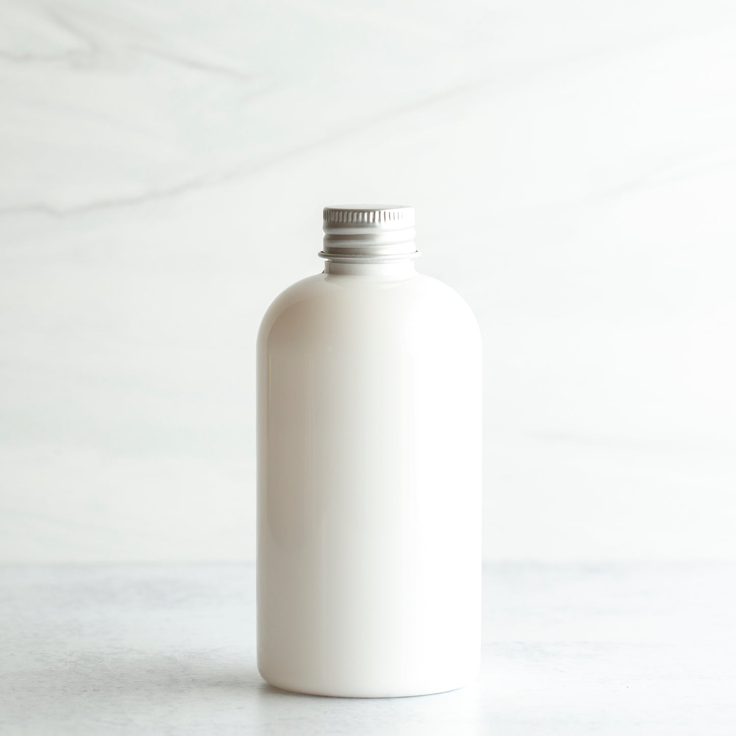 8 oz White PET Boston Round Bottle with 24-410 Aluminum Cap