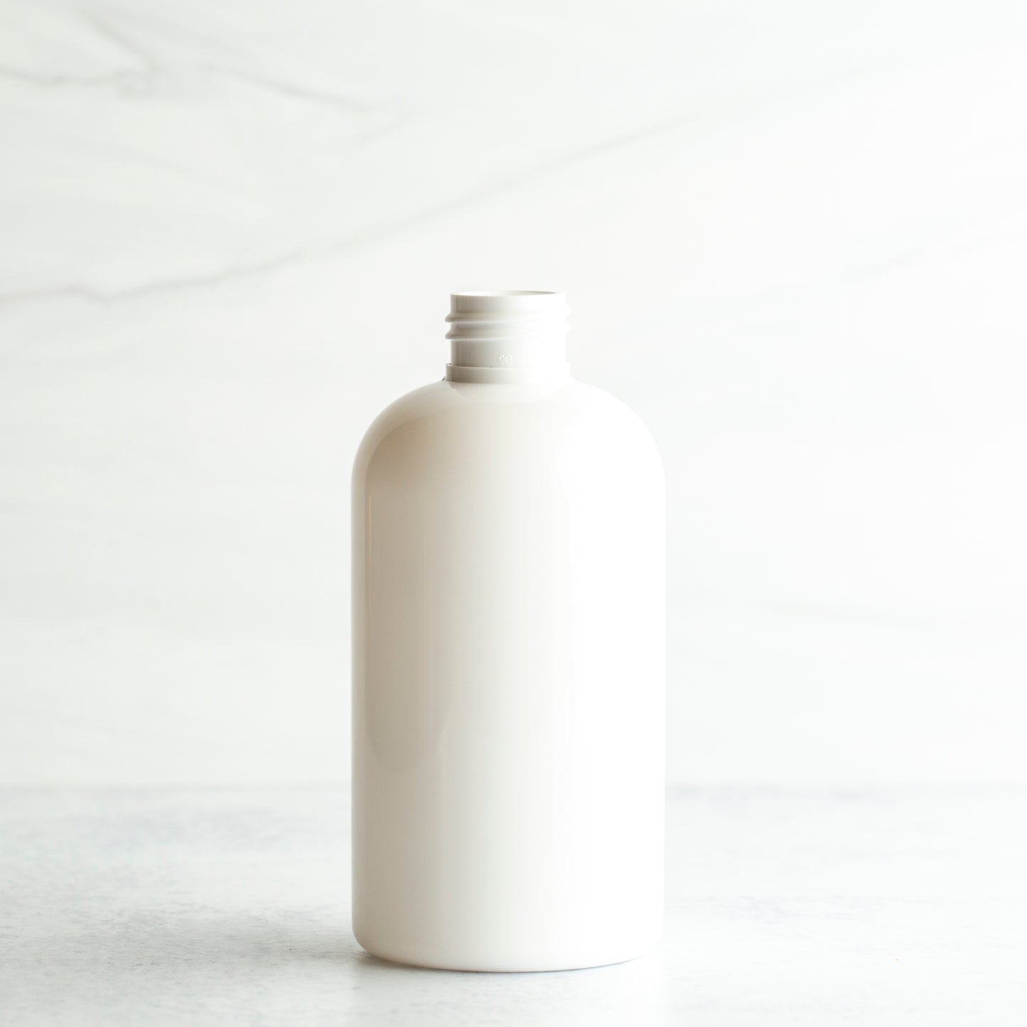 8 oz White PET Boston Round Bottle Without Closure