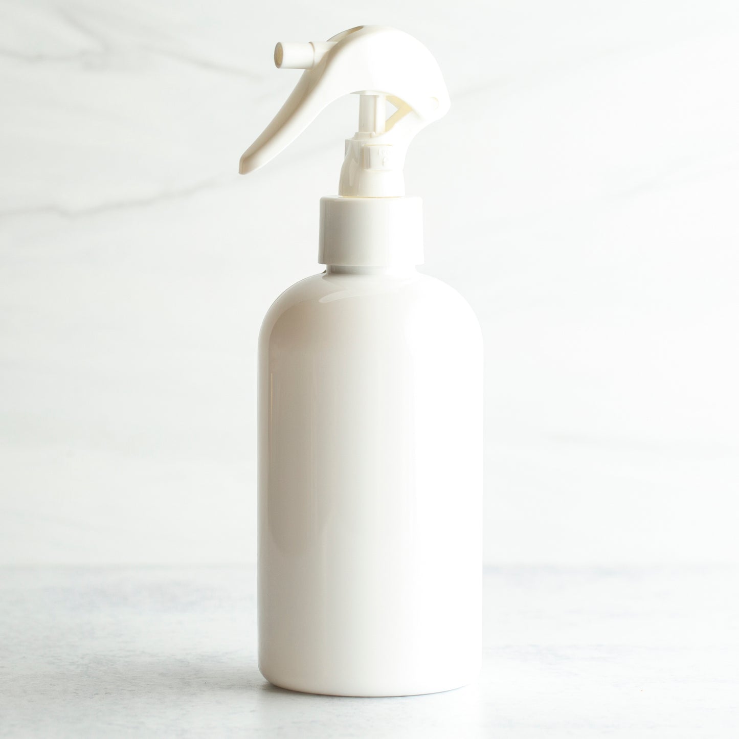 8 oz White PET Boston Round Bottle with 24-410 White Mini Trigger Sprayer