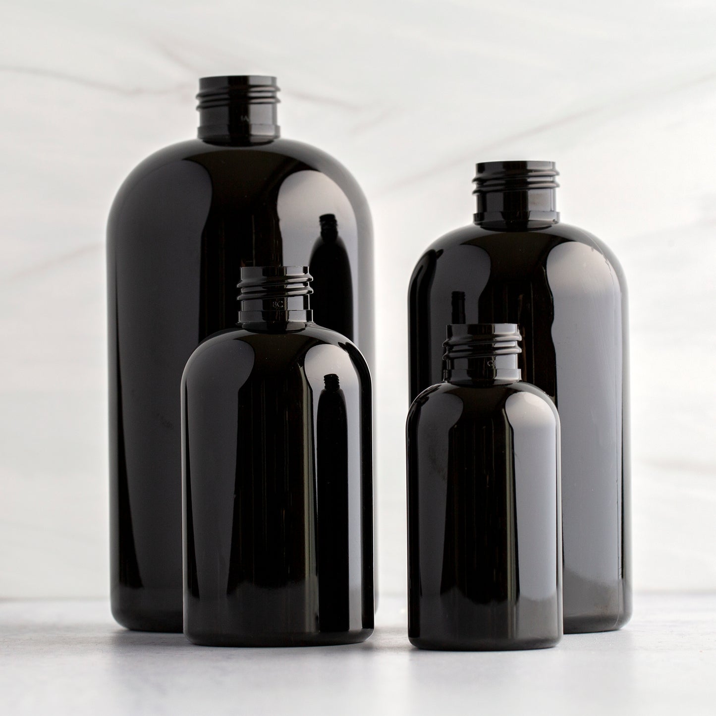 Black Boston Round Bottle Family