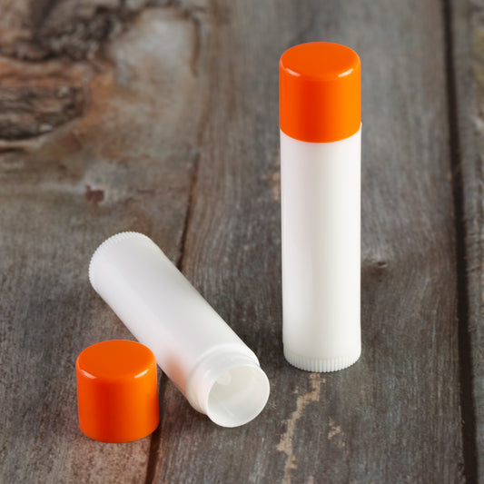 white lip balm tube orange cap