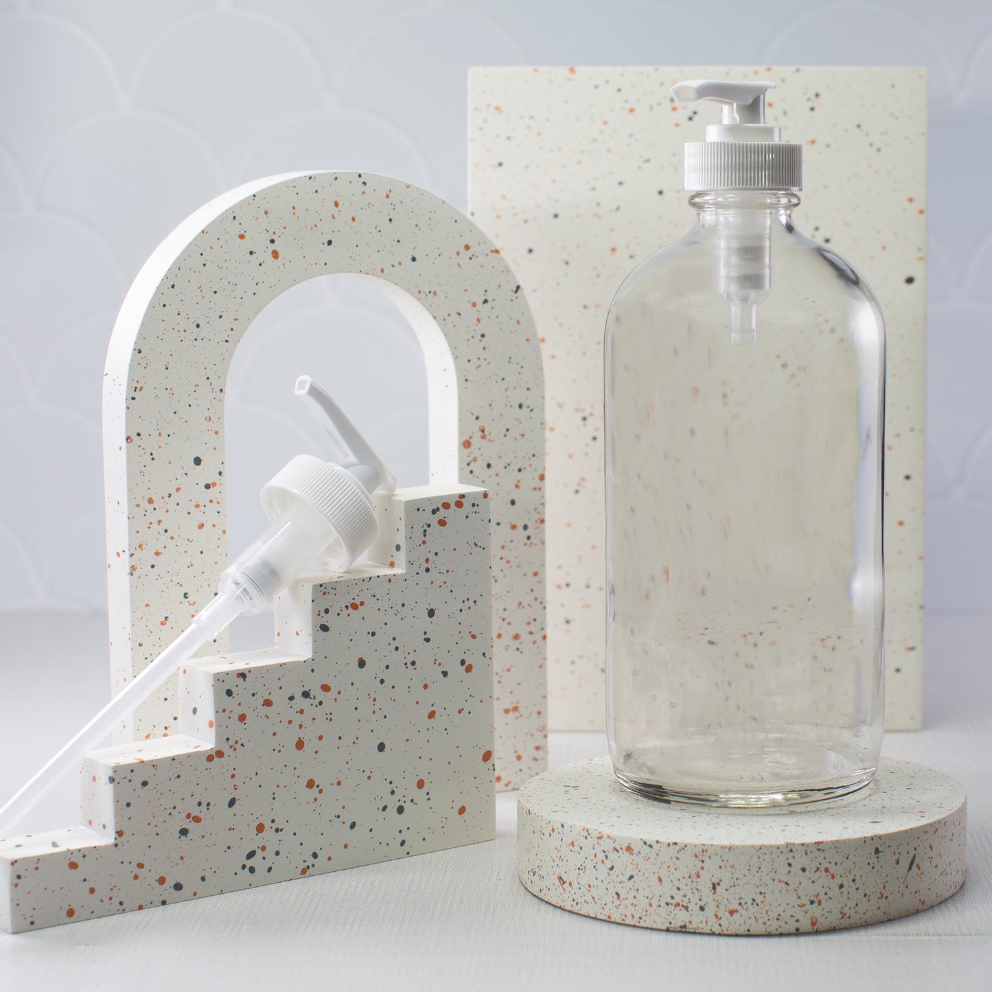 16 oz Clear Glass Bottle with 28-400 White Saddle Pump