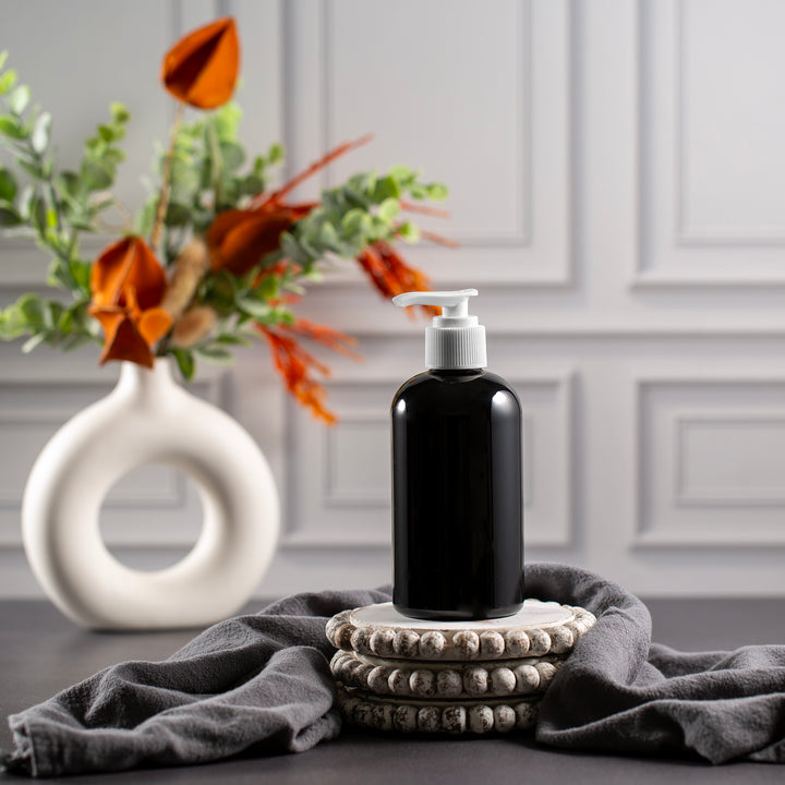 8 oz Black PET Boston Round Bottle With 24-410 Neck
