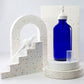 8 oz Blue Glass Boston Round Bottle with 28-400 White Regular Mist Sprayer