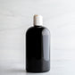 16 oz Black Boston Round Bottle White Disc