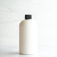 16 oz White PET Boston Round Bottle with 24-410 Black Ribbed Cap
