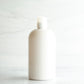 16 oz White PET Boston Round Bottle with 24-410 Natural Disc Cap
