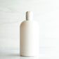 16 oz White PET Boston Round Bottle with 24-410 White Disc Cap