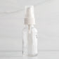 1 oz Clear Glass Bottle with White Treatment Pump