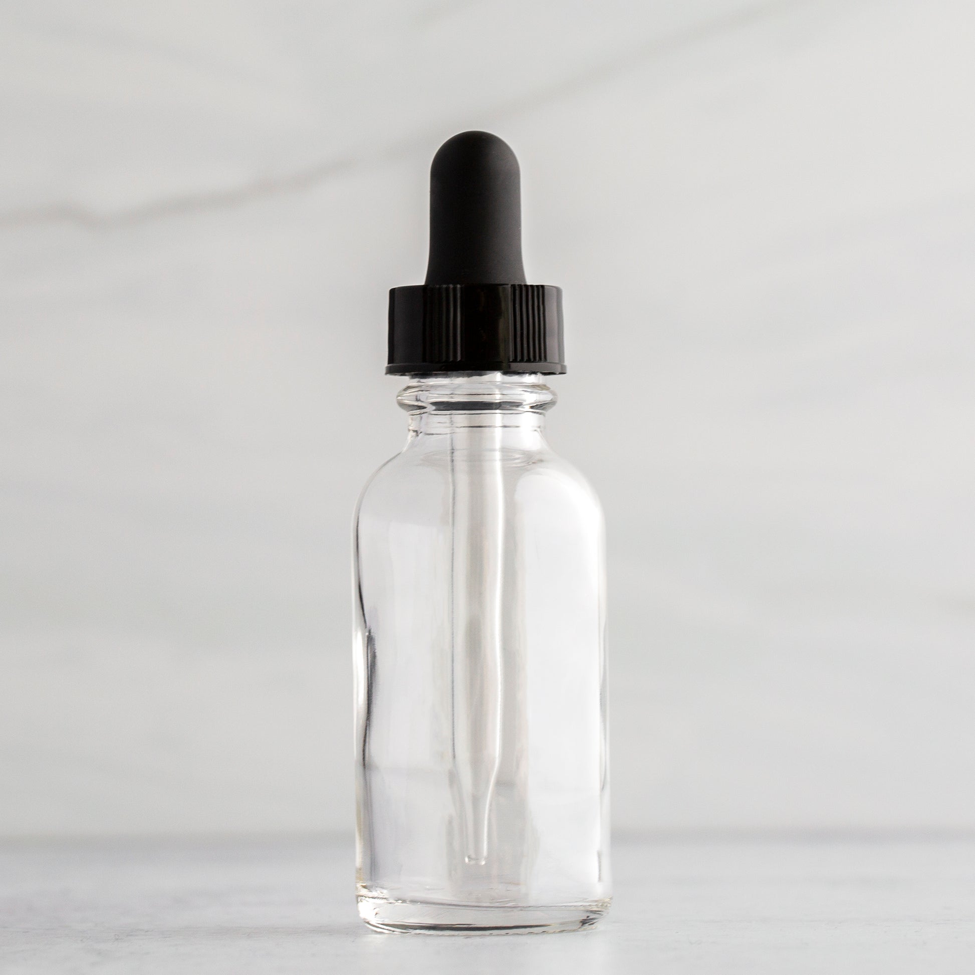 1 oz Clear Glass Bottle with Black Glass Tube Dropper