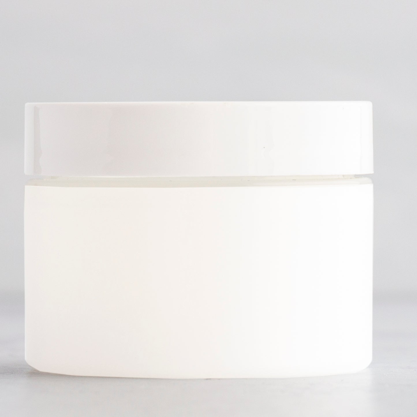 1 oz Frosted Straight Sided Plastic Jar with White Flat Gloss Cap