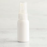 1 oz White PET Boston Round Bottle with 20-410 Natural Fine Mist Sprayer