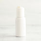 1 oz White PET Boston Round Bottle with 20-410 White Disc Cap