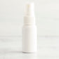1 oz White PET Boston Round Bottle with 20-410 White Fine Mist Sprayer