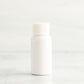 1 oz White PET Boston Round Bottle with 20-410 White Ribbed Cap
